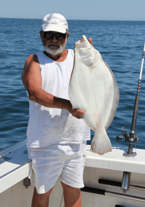 Our Fish Trap client caught a giant Rhode Island fluke near Block Island RI.